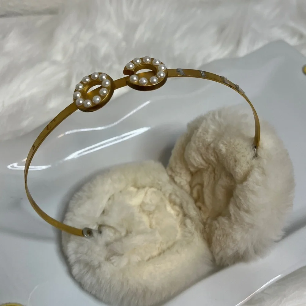 CHANEL VINTAGE Black and White Fur Earmuffs